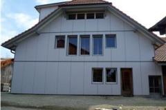 neue Fassade mit 3-Schichtplatten